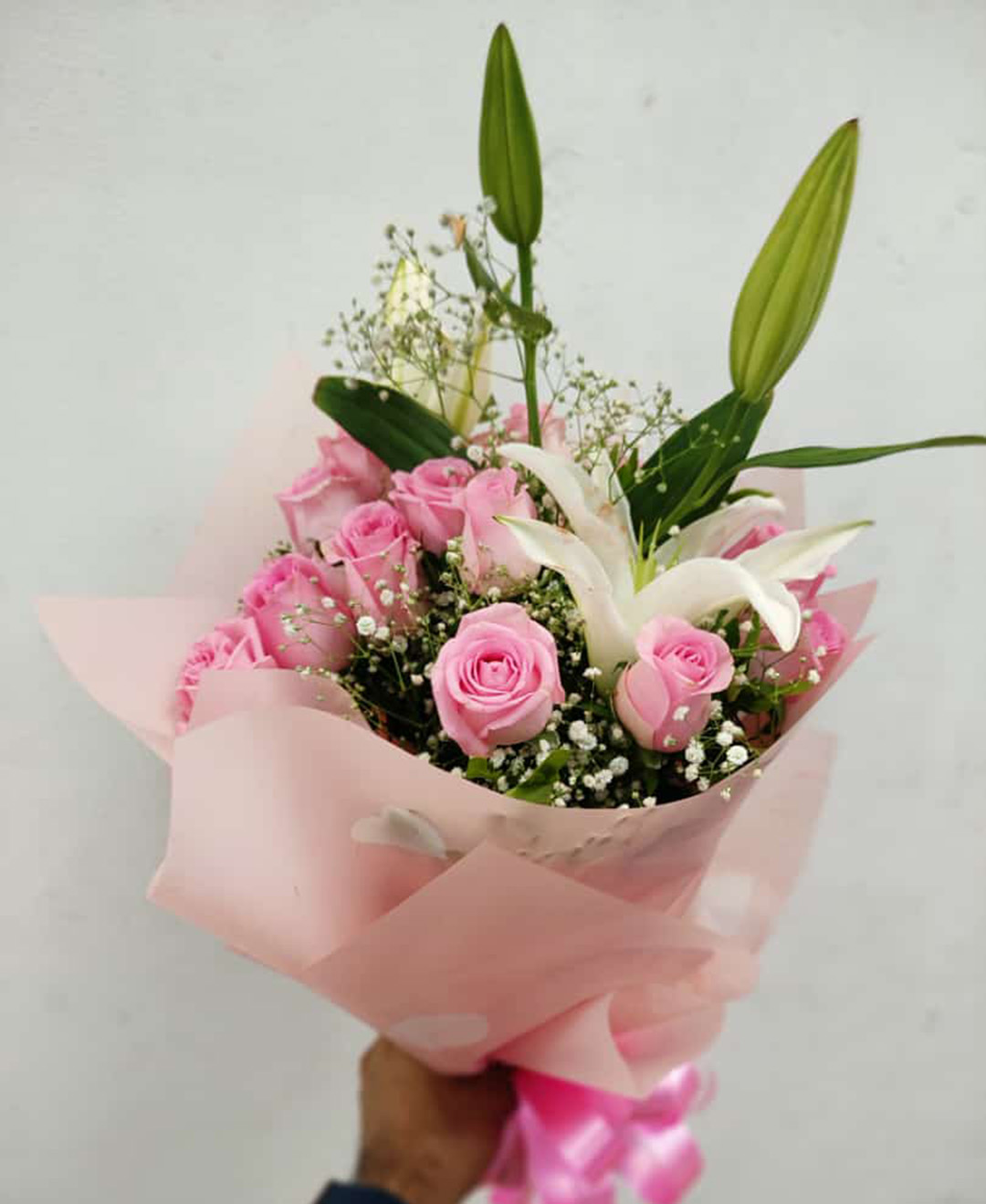 1 White Lilies And 13 Pink Roses Bunch With Pink Paper