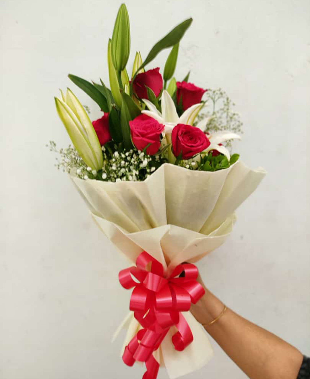 3 Oriental White Lilies And 15 Red Roses Bunch With Paper Packing