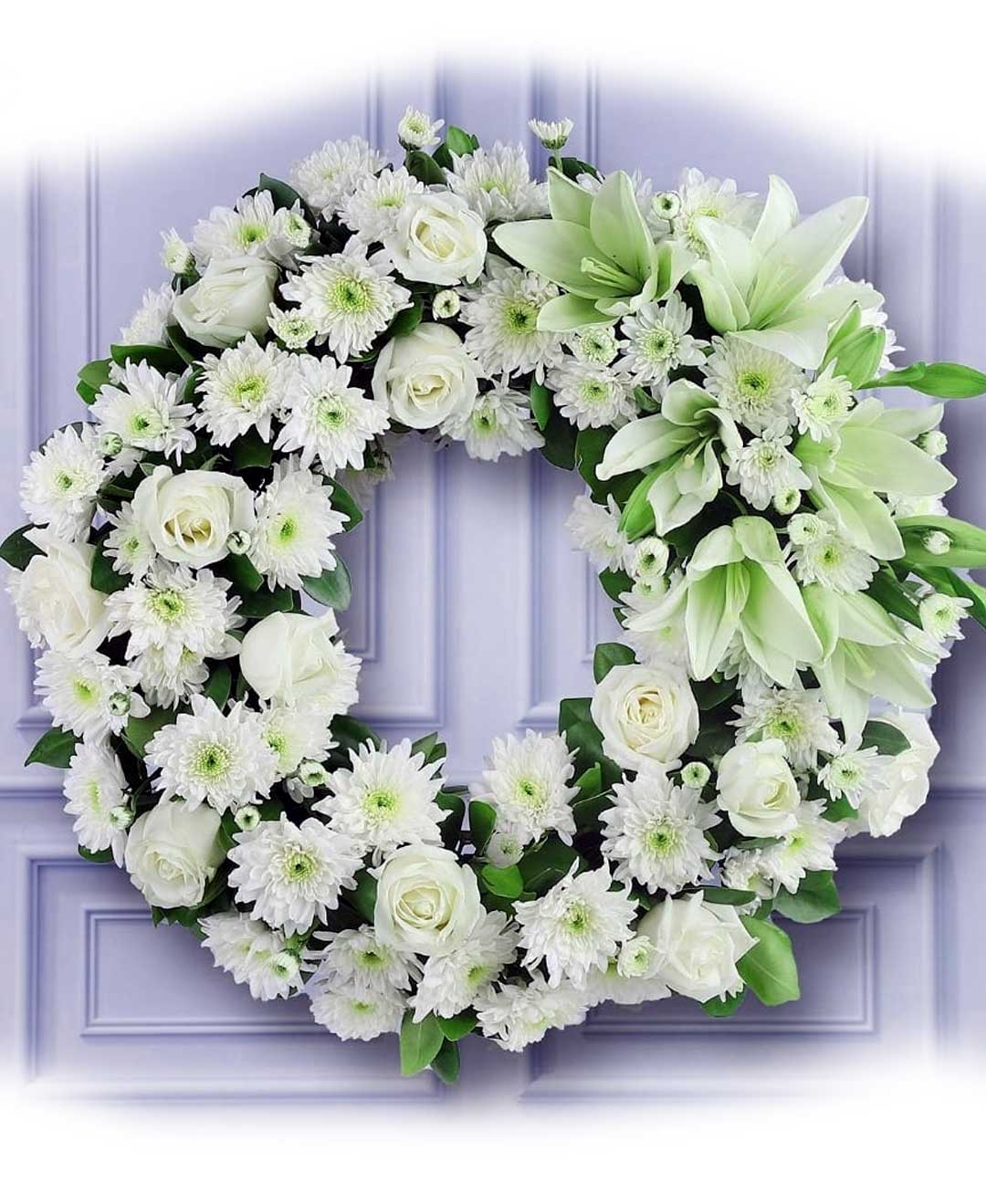 White Lilies, Chrysanthemums, and Roses Round Wreath Arrangement