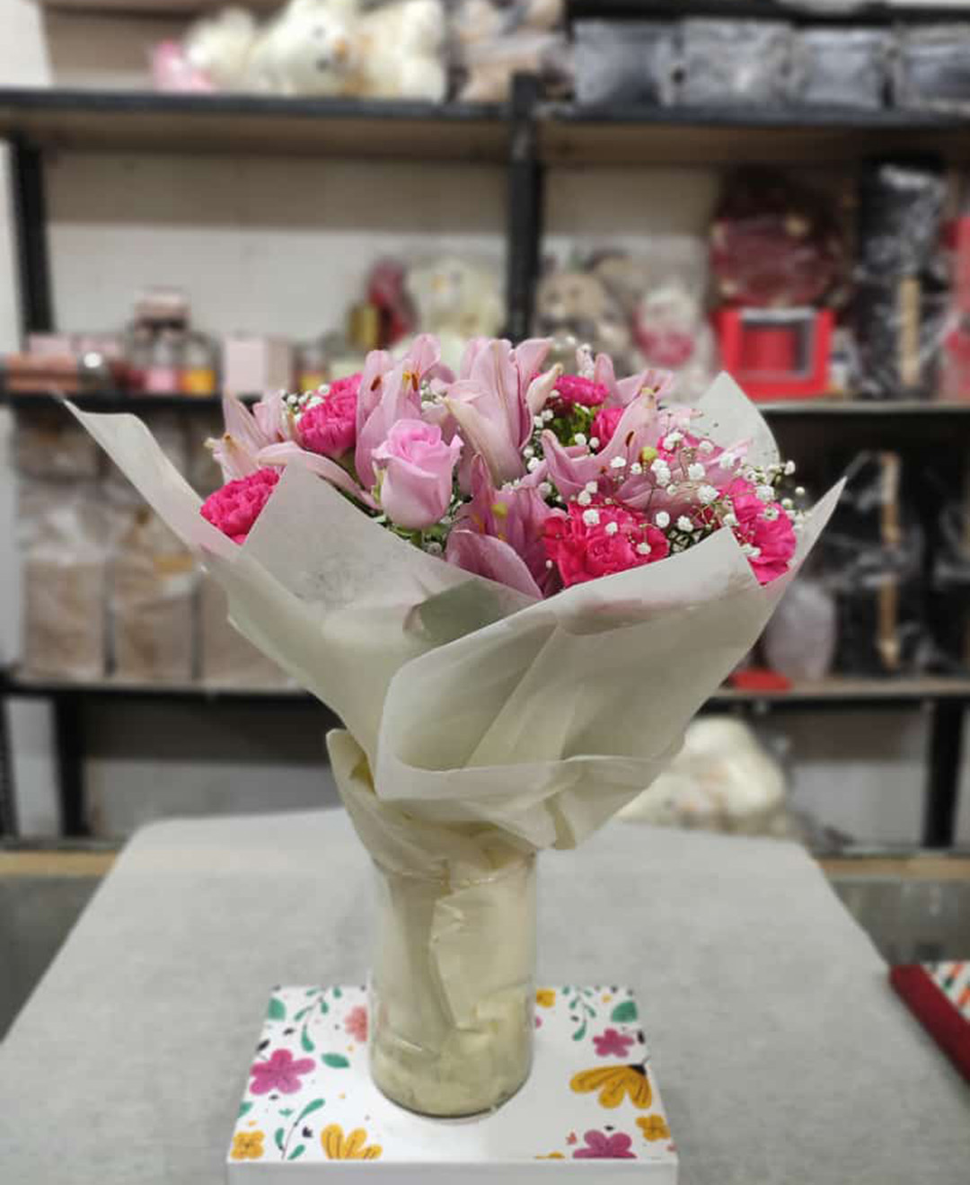 4 Pink Lilies, 8 Pink Roses And 12 Pink Carnation Glass Vase