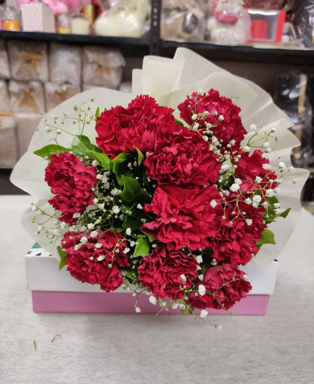 *10 Red Carnation Bunch With White Paper