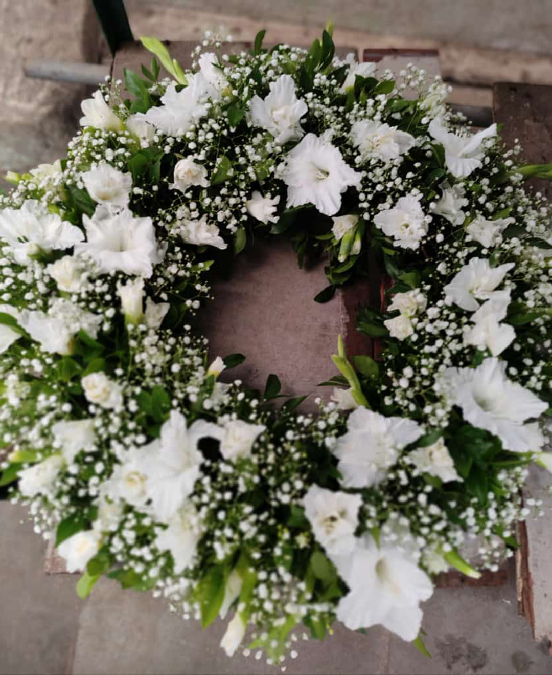 White Gladiola Round Wreath Arrangements