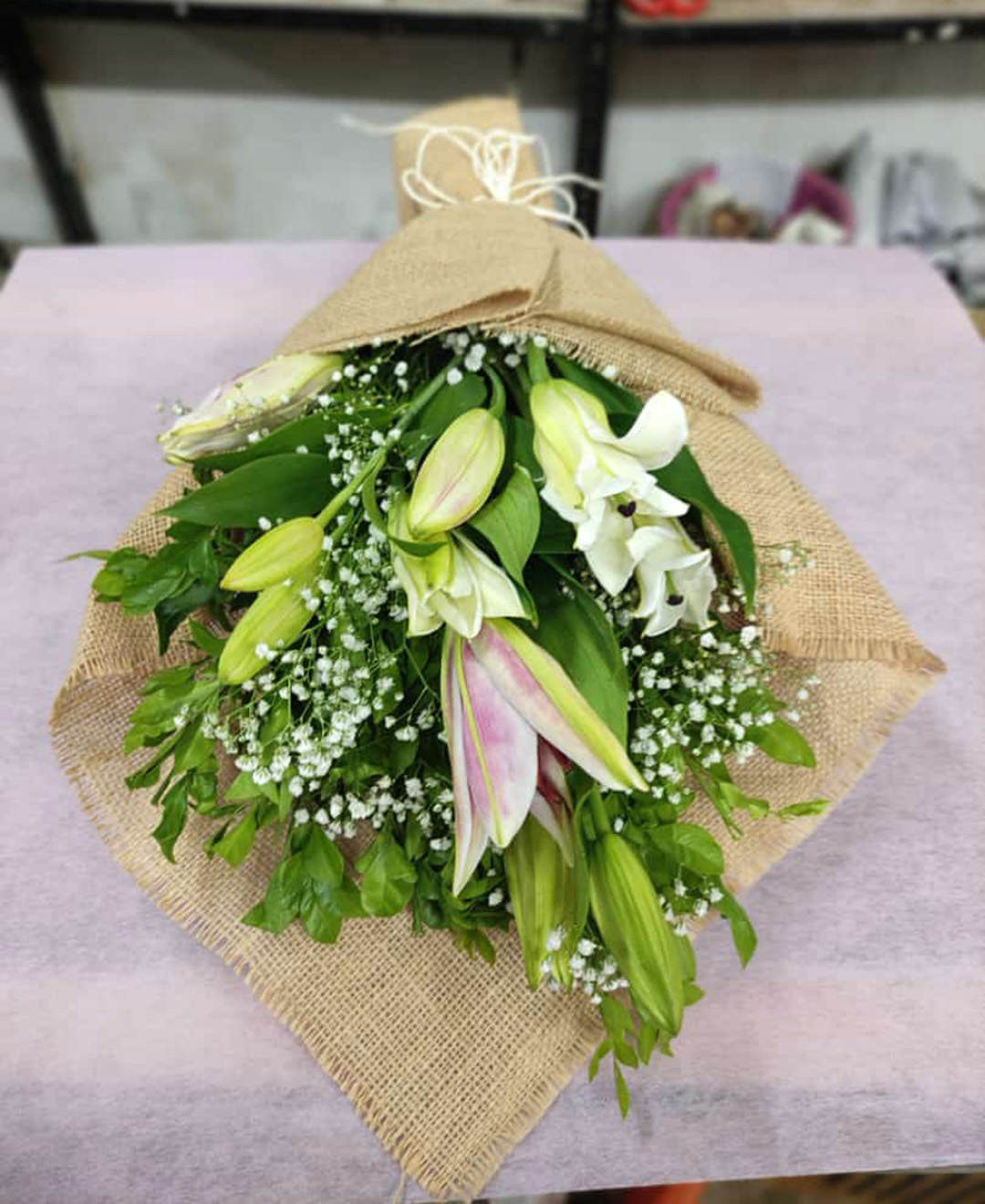 *3 Lilies With Jute Packing